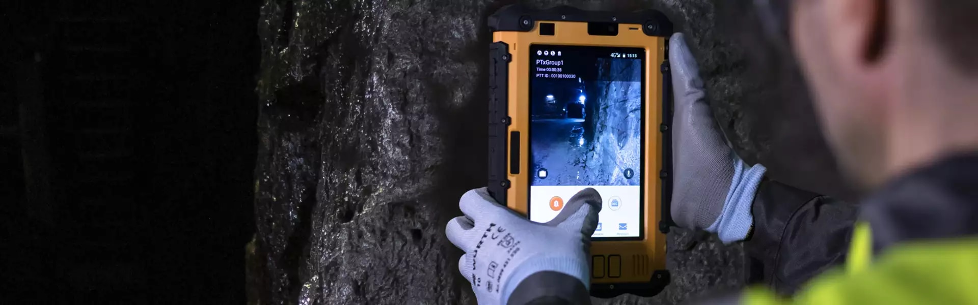 Worker in the mine with Nokia tablet