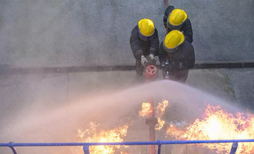 Fire men trying to control fire