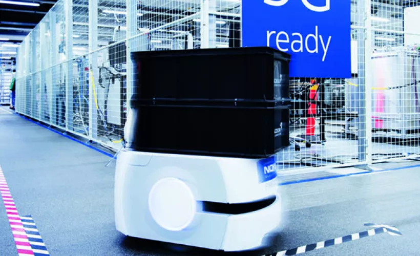 Robot carrying logistic on the factory floor