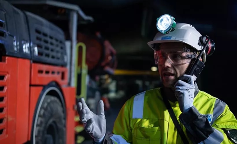 Mine worker with Nokia handheld